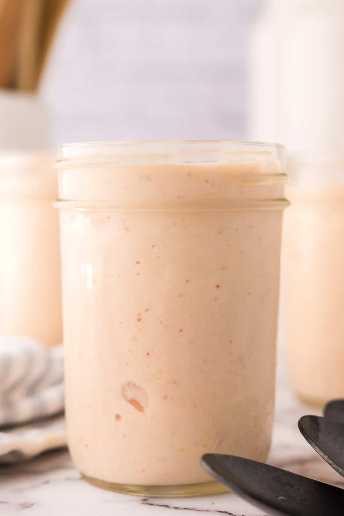 fresh fruit smoothie in mason jars.